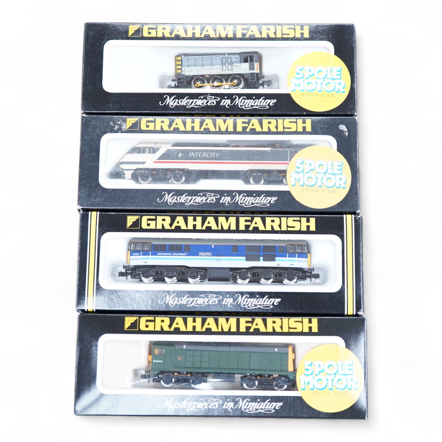 Four boxed Graham Farish N gauge railway diesel and electric locomotives; a BR class 20, D8144 (8204), a Regional Railways class 31, Wigan Pier 31421 (8067), a BR class 08, 08 834, (1002) and an Intercity class 91, 91005